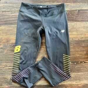 New Balance | Reflective Accelerate Black Leggings with Yellow and Pink Accents